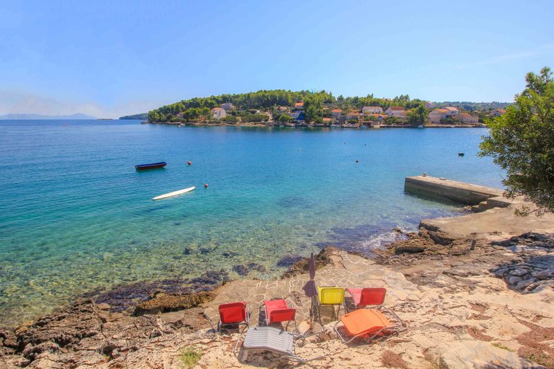 Tatinja beach Lumbarda village — small sandy beach in the village centre